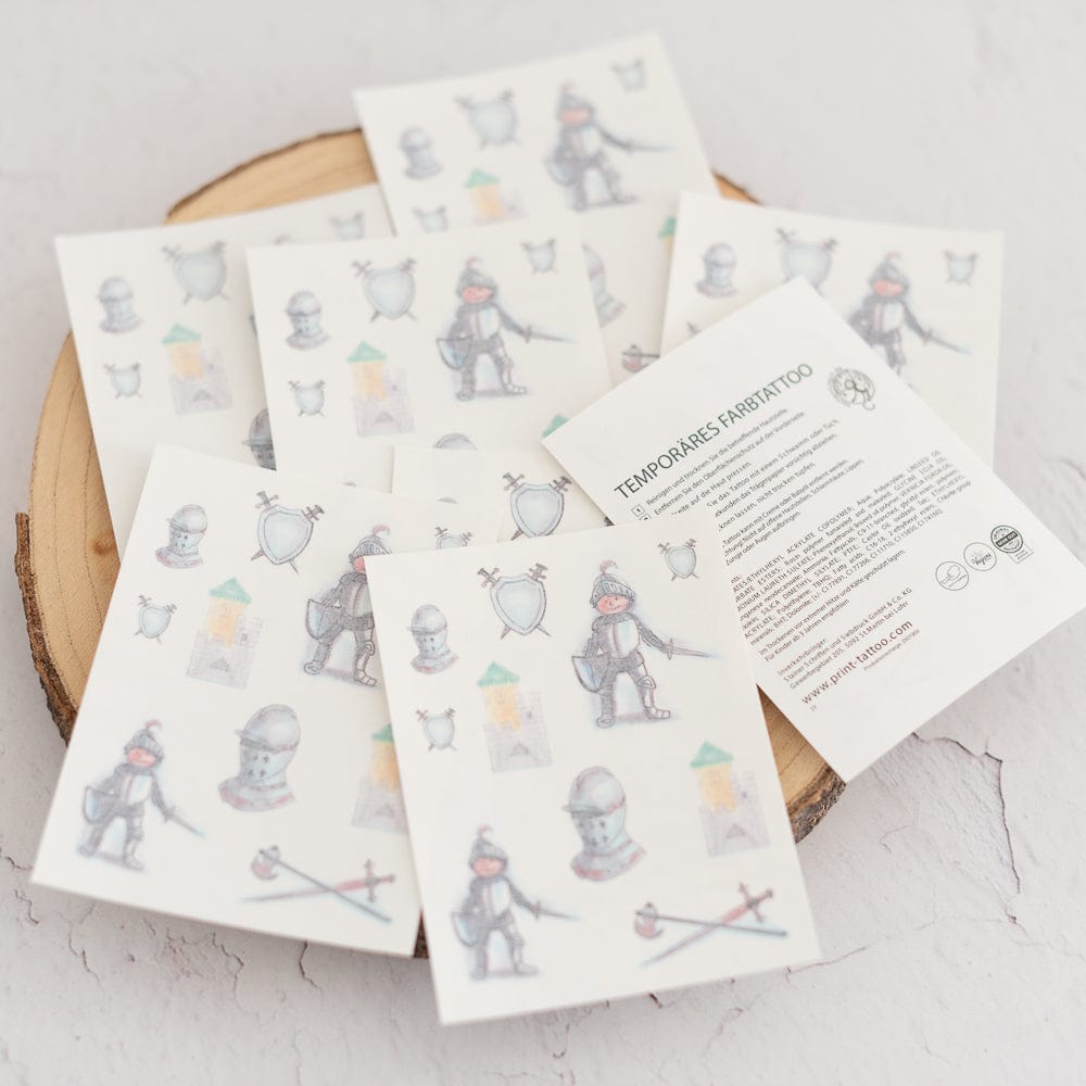 Ritter-Tattoos-1-Bogen-mit-10-Tattoos