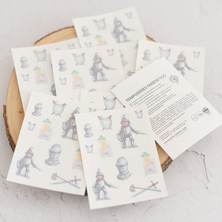 Ritter-Tattoos-1-Bogen-mit-10-Tattoos